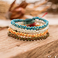 Macrame friendship bracelets, 'The Elements' (set of 4) - Element-Inspired 4-Piece Macrame Friendship Bracelet Set