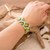 Beaded wristband bracelet, 'Amazing Avocado' - Avocado-Themed Handcrafted Wide Beaded Wristband Bracelet