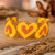 Beaded wristband bracelet, 'Yellow Queen of Hearts' - Yellow Orange Golden-Hued Beaded Bracelet with Heart Design