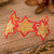 Beaded wristband bracelet, 'Honey Starlight' - Red and Golden-Hued Handmade Beaded Bracelet with Star Motif