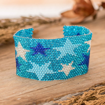 Beaded wristband bracelet, 'Constellation in Sky Blue' - Handmade Glass Beaded Star Wristband Bracelet in Sky Blue