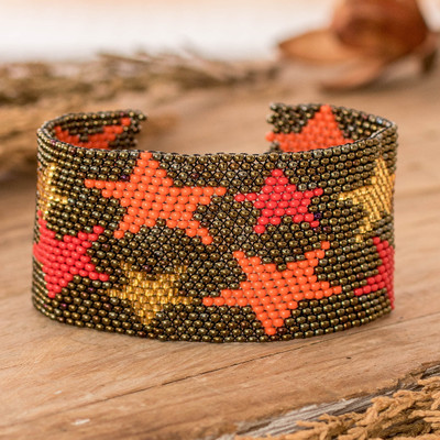 Beaded wristband bracelet, 'Constellation in Bronze' - Guatemalan-Made Bronze Glass Beaded Star Wristband Bracelet