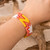 Beaded wristband bracelet, 'Sunrise Blast' - Star-Inspired Glass Beaded Wristband Bracelet in Warm Hues
