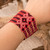 Macrame wristband bracelet, 'Red Jewel' - Handwoven Folk Art-Themed Red Macrame Wristband Bracelet