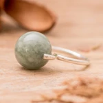 Jade cocktail ring, 'Minimalist Orb' - Modern Silver Ball Cocktail Ring with Light Green Jade Stone