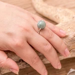 Jade cocktail ring, 'Minimalist Orb' - Modern Silver Ball Cocktail Ring with Light Green Jade Stone