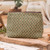 Cotton cosmetic bag, 'Green Ditsy' - Loomed Floral Green Cotton Cosmetic Bag with Leather Accent
