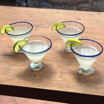 Handblown margarita glasses, 'Waves of Euphoria' (set of 4) - Handmade Eco-Friendly Blue-Rim 4-Piece Margarita Glass Set