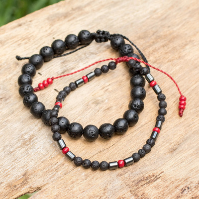 Glass and hematite beaded bracelet, 'Fiery Beads' (set of 2) - Adjustable 2-Piece Glass and Hematite Beaded Bracelet Set