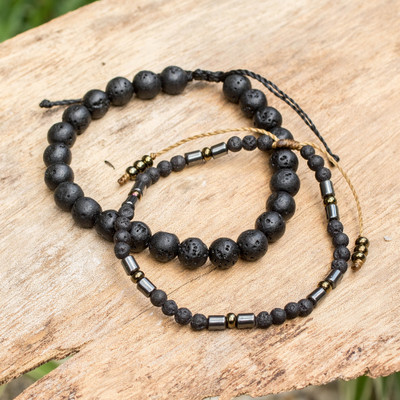 Glass and hematite beaded bracelet, 'Fortune Beads' (set of 2) - 2-Piece Golden-Toned Glass and Hematite Beaded Bracelet Set