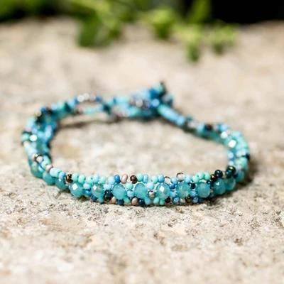 Beaded wristband bracelet, 'Oceanic Magic' - Adjustable Crystal and Glass Beaded Bracelet in Light Blue
