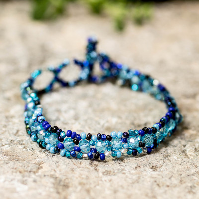 Beaded wristband bracelet, 'Sea Magic' - Handcrafted Adjustable Blue Crystal Glass Beaded Bracelet