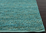 Natural solid turquoise jute area rug, 'Turquoise Loop' - Natural Solid Turquoise Jute Area Rug
