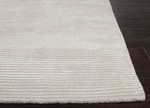 Wool and rayon chenille blend area rug, 'Ribbed Truffle' - Handloomed Solid Beige Ribbed Wool Rayon Chenille Area Rug