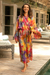 Batik rayon robe, 'Sunset Grove' - Red Orange Batik Print Long Sleeved Rayon Robe with Belt