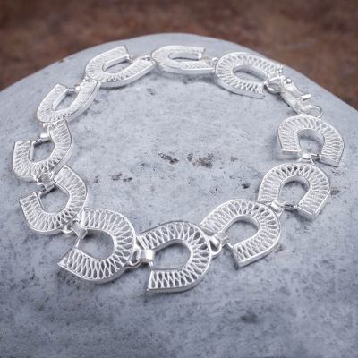 Silver filigree bracelet, 'Lucky Horseshoes' - Silver filigree bracelet