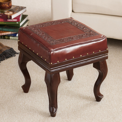 Leather and wood ottoman, Inca Guardian