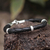 Men's leather braided bracelet, 'Bold Black' - Collectible Men's Leather and Silver Wristband Bracelet (image 2) thumbail