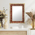 Reverse-painted glass wall mirror, 'Scarlet Flame' - Rectangular Handcrafted Floral Reverse-Painted Glass Mirror
