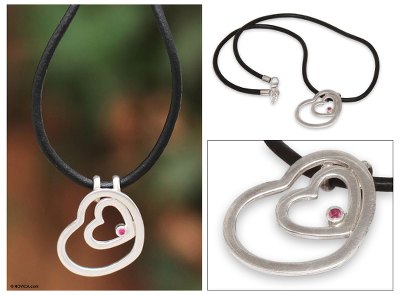 Sterling silver and leather heart necklace, 'Our Love' - Heart Shaped Leather Sterling Silver Pendant Necklace