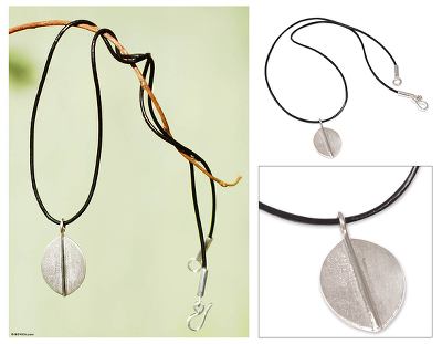 Sterling silver pendant necklace, 'Lucky Leaf' - Peruvian Leaf Sterling Silver Leather Cord Pendant Necklace