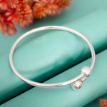 Sterling silver wrap bracelet, 'Irresistible' - Peruvian Sterling Silver Modern Wrap Bracelet