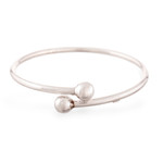 Sterling silver wrap bracelet, 'Irresistible' - Peruvian Sterling Silver Modern Wrap Bracelet