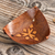 Leather catchall, 'Honey Pyramid Tattoo' - Leather Triangular Catchall Artisan Crafted in Peru thumbail