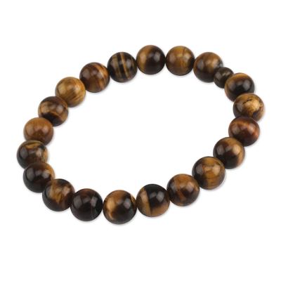 Tiger's eye and ceramic stretch bracelet, 'Inner Fire' - Artisan Crafted Tigers Eye and Ceramic Stretch Bracelet