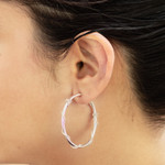 Sterling silver hoop earrings, 'Goddess of Health' - Modern Handmade Sterling Silver Hoop Earrings