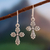 Sterling silver cross earrings, 'Crossing Leaves' - Leafy Cross Earrings Crafted of Sterling Silver in Peru