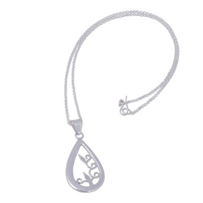 Sterling silver pendant necklace, 'Droplet of Life' - Silver Handcrafted Teardrop Necklace with Leaf Silhouettes