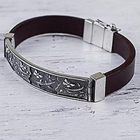 Sterling silver and leather wristband bracelet, 'Butterfly Garden' - Sterling Silver and Leather Wristband Bracelet from Peru