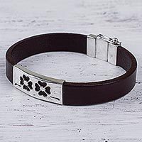 Sterling silver and leather wristband bracelet, 'Twin Clovers' - Sterling Silver and Leather Wristband Bracelet from Peru