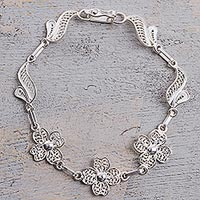 Sterling silver filigree link bracelet, 'Sparkling Flowers' - Sterling Silver Filigree Floral Link Bracelet from Peru
