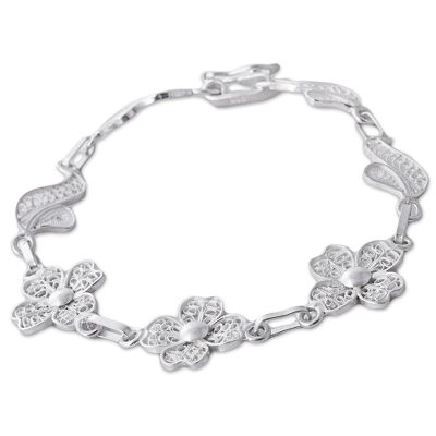 Sterling silver filigree link bracelet, 'Sparkling Flowers' - Sterling Silver Filigree Floral Link Bracelet from Peru