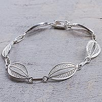 Sterling silver filigree link bracelet, 'Sparkling Crescents'