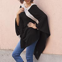 Featured review for Poncho, Black and Grey Beam of Light