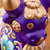 Ceramic figurine, 'Purple Pucara Bull' - Purple Floral Painted Ceramic Bull Sculpture from Peru