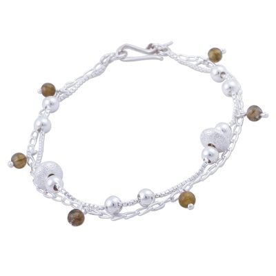Labradorite charm bracelet, 'Lima Intrigue' - Sterling Silver and Labradorite Charm Bracelet from Peru