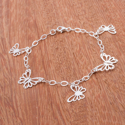Sterling silver charm bracelet, 'Enchanting Butterflies' - 925 Sterling Silver Butterfly Bracelet by Adriana de Gadea