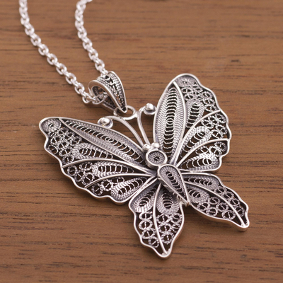 Sterling silver filigree pendant necklace, 'Nocturnal Butterfly' - Sterling Silver Butterfly Filigree Pendant Necklace