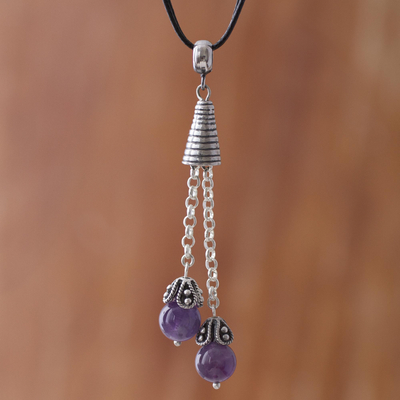 Amethyst pendant necklace, 'Floral Pendulums' - Natural Amethyst Pendant Necklace on Cotton Cord from Peru