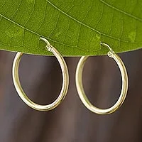 Gold plated sterling silver hoop earrings, 'Eternal Gleam' - 18k Gold Plated Sterling Silver Hoop Earrings from Peru