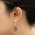 Pumpkin shell dangle earrings, 'Infinite Cosmos' - Sterling Silver and Pumpkin Shell Dangle Earrings from Peru