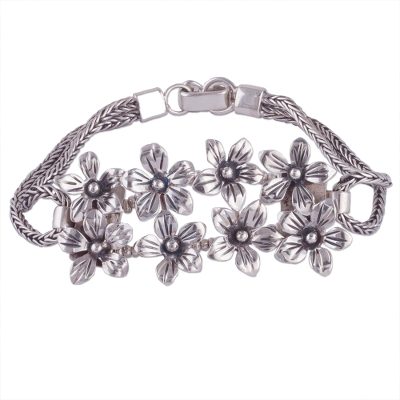 Sterling silver pendant bracelet, 'Peruvian Lilies' - Fair Trade Sterling Silver Floral Bracelet from Peru