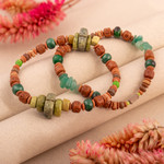 Serpentine, agate, and ceramic beaded stretch bracelets, 'Wind and Earth' (pair) - Two Ceramic Beaded Bracelets with Agate and Serpentine