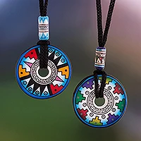 Ceramic pendant necklaces, 'Evening Fiesta' (pair) - Pair of Blue and White Geometric Ceramic Pendant Necklaces