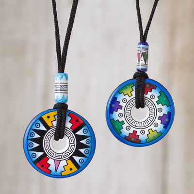 Ceramic pendant necklaces, 'Evening Fiesta' (pair) - Pair of Blue and White Geometric Ceramic Pendant Necklaces