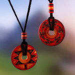 Ceramic pendant necklaces, 'Enchanted Land' (pair) - Pair of Red and Black Ceramic Pendant Necklaces from Peru